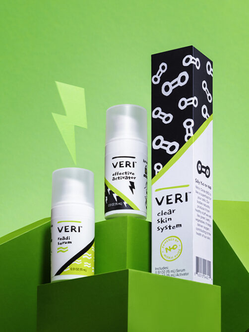 Photo of the VERI clear skin system on a green background