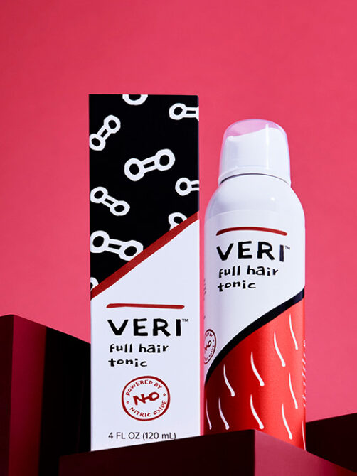 Photo of VERI full hair tonic on a red background